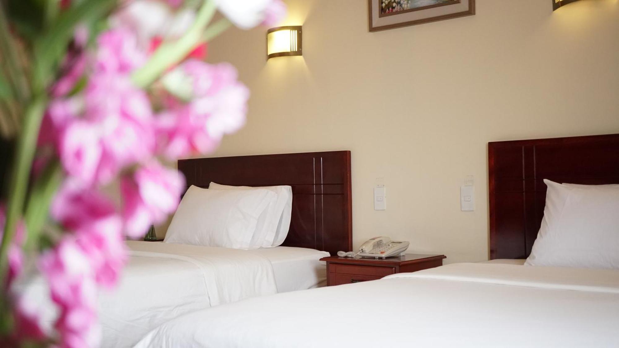 Hotel Lottus Quito Habitación foto